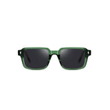 Green sunglasses with dark lenses on a white background