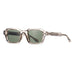 Sunglasses with brown frame and green lenses on a white background