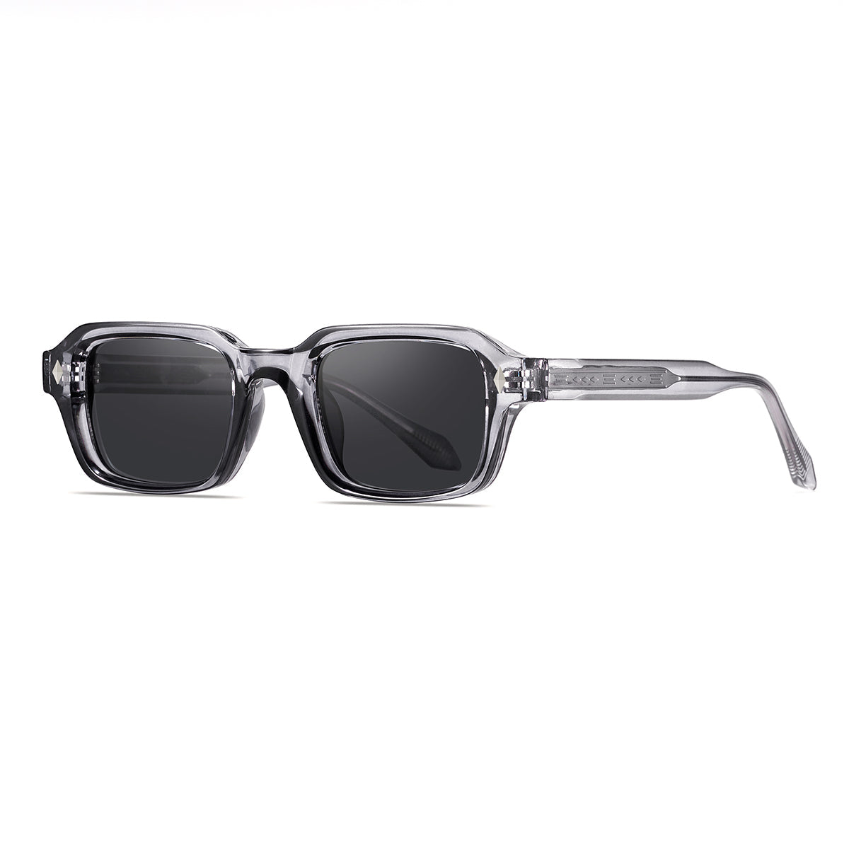 Sunglasses with clear frame and dark lenses on a white background
